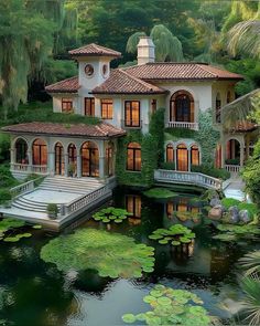 this is an artist's rendering of a house in the woods with water lilies