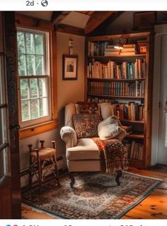 an old fashioned chair in front of a bookshelf with lots of books on it