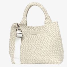 Our most popular woven totes are handwoven with a lycra blend and contrasting weave. Each tote comes with a matching pouch and detachable strap to transform your tote into a crossbody! Color: Bone Dimensions: Expanded: 18” x 9” x 8” / 6” Handle Drop White Woven Leather Tote Shoulder Bag, Cream Top Handle Bag With Woven Leather, White Woven Leather Shoulder Bag For Everyday Use, White Woven Leather Tote Bag, Cream Woven Leather Bag For Daily Use, White Woven Leather Bag For Everyday Use, White Woven Leather Bag For Daily Use, White Intrecciato Weave Bag For Travel, White Intrecciato Weave Shoulder Bag For Everyday Use