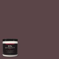 a jar of dymasty colorante on a gray background