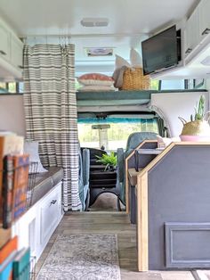 the interior of a camper van is clean and ready for people to use it