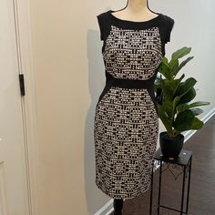 Brand New Geo Print Ap Sheath Dress. Back Zip, Fully Lined, Sleeveless. Size 6. Measures 17” Pit To Pit X 37” Long. Chic Black And White Sleeveless Dress, Chic Sleeveless Black And White Midi Dress, Fitted Knee-length Black And White Dress, Fitted Black And White Knee-length Dress, Formal Sleeveless Black And White Dress, Elegant Black And White Knee-length Dress, Elegant Sleeveless Black And White Midi Dress, Flare Dress Casual, Layered Ruffle Dress