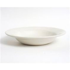 a white bowl sitting on top of a table