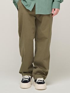 This is a casual and comfortable banding pants that are made out of high quality cotton 100% fabric. With design detail of semi oversized silhouette, elastic waistband with string, and minimal detail it gives a comfortable and trendy mood.- Relaxed semi oversized silhouette- Side pockets and back patch pockets- Elastic waistband with string Spring Khaki Cotton Cargo Pants, Baggy Khaki Pants For Loungewear, Relaxed Solid Cotton Pants, Relaxed Solid Color Cotton Pants, Relaxed Cotton Pants In Solid Color, Loosely Fitted Khaki Cotton Cargo Pants, Cotton Khaki Cargo Pants With Elastic Waistband, Relaxed Cotton Parachute Pants With Elastic Waistband, Oversized Solid Cotton Bottoms