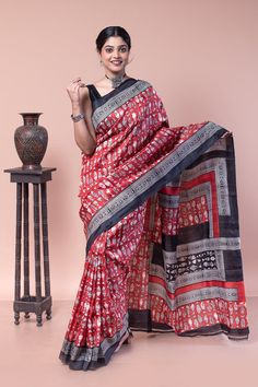 One of the most unique red silk sarees in hand-block printed design. The fish motifs in golden yellow color are the protagonists in this hand-woven mulberry silk saree. Silk mark certified. COLOUR: Red and Black CRAFT: Hand block printing DIMENSIONS: Saree length 6.5 Mts., Saree width 1.14 Mts. Blouse piece inclusive. NET QUANTITY: 1 pc saree PATTERN: Fish motif PRODUCT MATERIAL: Handwoven Pure Mulberry Silk saree PRODUCT TYPE: Saree with Blouse piece WEIGHT: 350 g  WASH INSTRUCTIONS: Dry cleaning is recommended for this product. Iron inside out. Do not bleach and expose this product to excessive heat and sunlight for long. Art Silk Red Dupatta With Printed Motifs, Red Art Silk Dupatta With Printed Motifs, Red Traditional Wear With Kalamkari Print For Puja, Red Tussar Silk Traditional Wear With Kalamkari Print, Red Kalamkari Katan Silk Traditional Wear, Red Silk Saree With Kalamkari Print, Red Block Print Saree For Festive Season, Festive Red Saree With Kalamkari Print, Red Chanderi Traditional Wear With Kalamkari Print