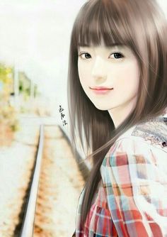 a woman with long hair standing in front of a train track