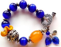 Colorful Bracelet, Bold Chunky Cobalt & Butterscotch Asymetrical Design, Lampwork Statement Bracelet Adjustable Blue Fusion Beaded Bracelets, Adjustable Blue Beaded Fusion Bracelets, Fusion Style Blue Beaded Bracelets Gift, Blue Fusion Style Beaded Bracelets As Gift, Fusion Style Blue Beaded Bracelets For Gift, Blue Fusion Style Bracelet As A Gift, Blue Fusion Style Bracelet For Gifts, Blue Fusion Style Bracelet As Gift, Blue Fusion Style Bracelet For Gift