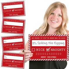 a woman holding up a red and white ticket for an event with four tickets in front of her