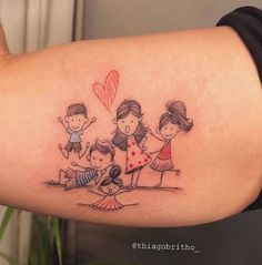 a woman's arm with a drawing of three children and a heart balloon on it