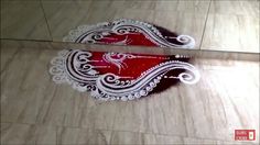 a pair of red and white shoes sitting on top of a tile floor