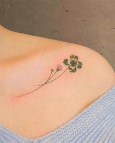 four leaf clover tattoo on the shoulder