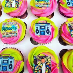 cupcakes decorated with colorful frosting and designs