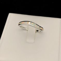 White Fire Opal Sterling Silver Inlay Ring, Fire Opal Ring, Minimalist Ring, Gemstone Ring, October Birthstone Gift, Simple Band Ring, Minimalistic Ring, Stacking Ring 💎 Gemstone: Conflict-free Cabochon Fire-Opal (Origin Mexico) 💎 Base Material: Solid Sterling Silver (925) 💎 Additional Material: Rhodium (Precious Metal) 💎 Stamps / Markings: 925 After-Sale Services: 💎 30 Days No Quibble Return or Exchange 💎 Guarantee: 90 Days Free Repairing ( Free Exchange if necessary) 💎 Warranty: Lifetim Minimalistic Ring, Curve Ring, October Birthstone Rings, White Opal Ring, Simple Band, Fire Opal Ring, Etsy Wedding Rings, Ring Stacking, Birthstone Gifts