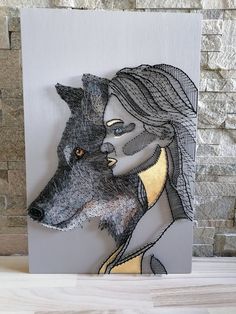 a painting of a woman and a wolf on a white background with grey brick wall behind it