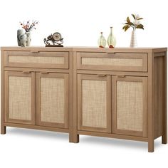 the sideboard is made out of wood and has two doors on each side, one with