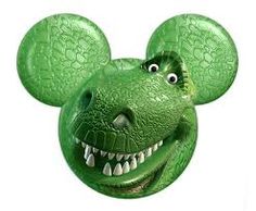 a close up of a green mickey mouse head