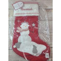 a christmas stocking with a snowman on it