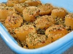 some food in a blue dish on a table