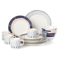 a set of dinnerware with blue and white stripes