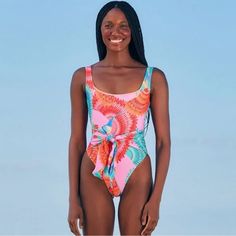 Details & Care Bright Colors And Bold Toucans Pattern This One-Piece With A Flattering Tie-Front Detail. Cheeky Back Coverage 84% Polyamide, 16% Elastane Machine Wash, Line Dry Made In Brazil Size Small $175 New To Poshmark? Sign Up Using The Code Limitedgems And Save $10 On Your Purchase! Tropical Multicolor Bodysuit For Pool, Pink Tropical One-piece Swimwear, Pink Flamingo Print Swimwear For Beach, Pink Flamingo Print Swimwear For Vacation, Pink Sleeveless One-piece For Beach Party, Pink Flamingo Print Swimwear For Poolside, Pink Printed One Piece For Vacation, Pink Printed One-piece Swimsuit, Flamingo Print Beachwear Swimwear For Spring