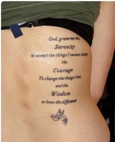 the back of a woman's stomach with an inscription on it that reads, god grant