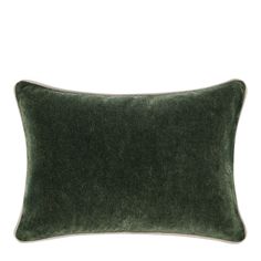 a green velvet pillow on a white background