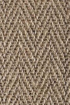 the texture of an upholstered tweed fabric