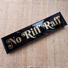 a sign that says no riff raff on it