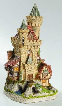 a miniature model of a castle on top of a hill