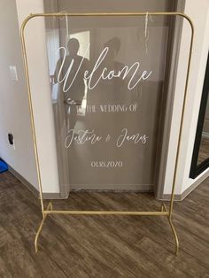 a welcome sign is placed in front of a door with the words welcome on it