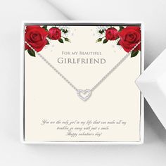 a gift box with a necklace that says, for my beautiful girlfriend