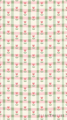 a green and pink checkered pattern with leaves