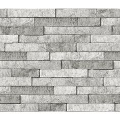 an image of a brick wall textured with gray stone tiles or brickstones