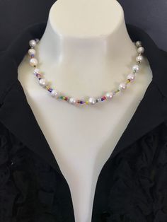 NEW Summer pearl and colorful bead necklace! This handmade 16 inch delicate pearl and gemstone necklace is dainty, super cute with gold filled lobster lock and 2 inch adjustment chain. Perfect for summer! You can use it to layer with your other pearl and gold chain necklaces as well, see images for ideas. The pearls are genuine cultured freshwater pearls, size 8mm to 9mm, white, good quality and the various assorted colorful beads. The length is 16 inches with the adjustment chain, 18 inches. Th Pearl Choker With Colorful Round Beads, Colorful Pearl Beaded Choker Necklace, Colorful Beaded Pearl Choker, Summer Pearl Beaded Single Strand Necklace, Summer Single Strand Pearl Beaded Necklaces, Summer Pearl Single Strand Beaded Necklace, Summer Single Strand Pearl Beaded Necklace, Colorful Beads Pearl Choker Necklace, Colorful Beaded Pearl Choker Necklace