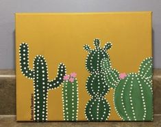 a painting of three cactuses on a yellow background