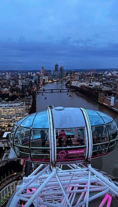 an aerial view of the london eye at dusk