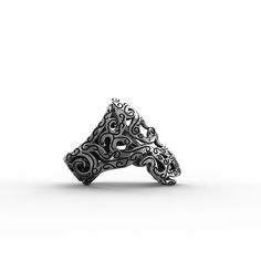 Maori Skull Ring in Sterling Silver (925) - Production time from 2 to 3 weeks The Maori skull ring by Feel No Pain is a jewel for men and women made of 925 sterling silver and engraved with New Zealand culture decorations. The entire surface of the skull ring is covered with symbols inspired by the Maori, including the famous tattoos that have become a sign of recognition throughout the world. Feel No Pain has revisited its design, giving it an antique and old school touch. The silver ring was m Carved Sterling Silver Skull Ring, Symbolic Sterling Silver Open Skull Ring, Carved Sterling Silver Skull Ring For Gift, Sterling Silver Open Skull Ring, Symbolic Style, Sterling Silver White Gold Skull Open Ring, Gothic Skull Ring In Sterling Silver White Gold, Engraved White Gold Skull Ring In Sterling Silver, White Gold Sterling Silver Skull Open Ring, Silver Skull-shaped Engraved Rings