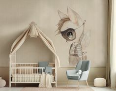 a baby's room with a white crib, chair and wall mural