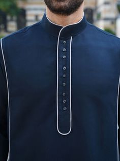 Classic Cotton Kurta For Semi-formal Occasions, Navy Collared Top With Buttons, Long Sleeve Kurta With Button Cuffs For Workwear, Elegant Long Sleeve Kurta With Button Cuffs, Navy Formal Top With Buttons, Formal Long Sleeve Kurta With Buttons, Classic Long Sleeve Kurta With Buttons, Elegant Long Sleeve Kurta With Button Closure, Nehru Waistcoat