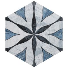 a blue and white hexagonal tile pattern on a white background that looks like it has been painted