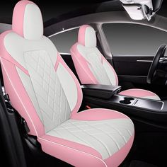 the interior of a car with pink and white leather upholstered seat covers on it