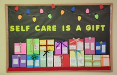 a bulletin board that says self care is a gift with colorful boxes and ribbons on it