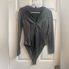 Black Faux Leather Long Sleeve Bodysuit. Never Worn. Chic Faux Leather Party Bodysuit, Olive Green Bodysuit, Neon Bodysuit, Long Sleeve Mesh Bodysuit, Tan Bodysuit, Purple Zebra, Tops Shein, Gray Romper, Bodycon Bodysuit