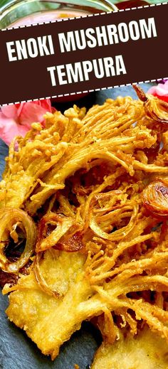 an enokii mushroom tempura on a plate with the title above it