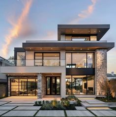 a large modern house with lots of windows