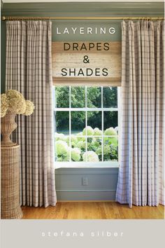 a window with the words layering drapers and shades on it in front of an open