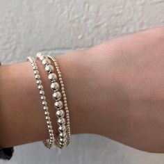 This stretchy gold-filled bracelet features small round beads. The beads are strung on elastic cord for easy-on, easy-off wear. Mix and match with your favorite bracelets and stack as many as you love. Sold separately. Available in 14k Gold Fill | Sterling Silver Available in 2mm | 3mm | 5mm Round Beads