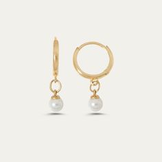 Pearl Drop Earrings in 14k solid gold, handcrafted in Europe. These earrings are perfect to wear all the time and add a touch of elegance to any stack. * Hoop diameter 12mm * Hoop width 2.5 mm * Pearls, 4.3 mm Everyday 14k Gold Hoop Earrings With Pearl Charm, Pearl Charm Huggie Earrings, Pearl Huggie Earrings For Wedding, Delicate Huggie Pearl Earrings With Charm, 14k Gold-filled Huggie Hoop Earrings With Pearl Charm, 14k Gold Pearl Charm Huggie Earrings, Wedding Huggie Hoop Earrings With Pearl Drop, Dainty Huggie Pearl Earrings With Charm, Wedding Pearl Drop Huggie Earrings