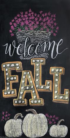 a chalkboard sign that says welcome fall