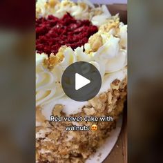 a red velvet cake with walnuts and white frosting is shown in this video